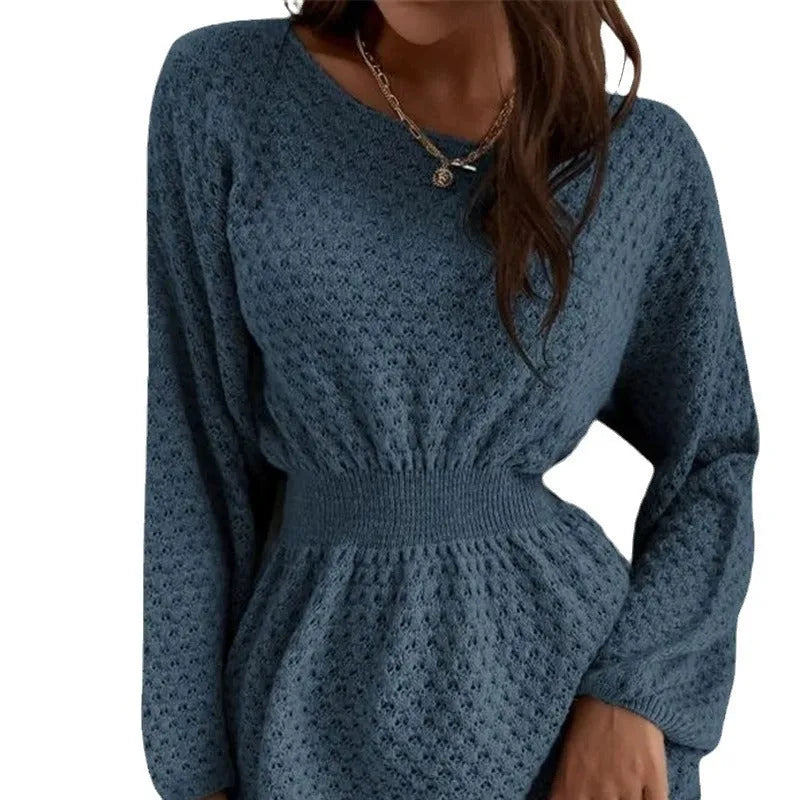 Blue women's knitted dress with hand-crocheted flowers, round neck, and fitted waist.
