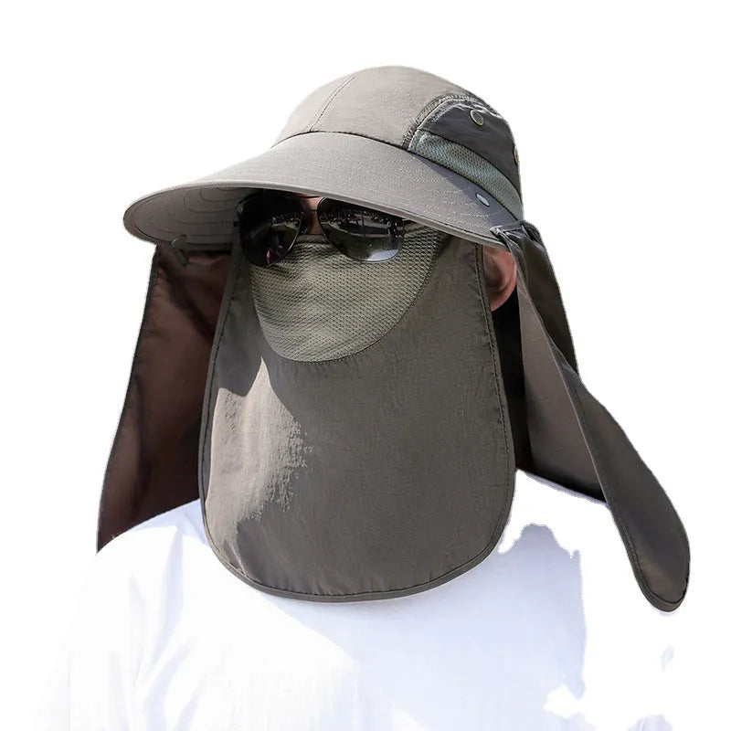 Man wearing a khaki sun hat with a built-in USB-rechargeable fan for face and neck protection.