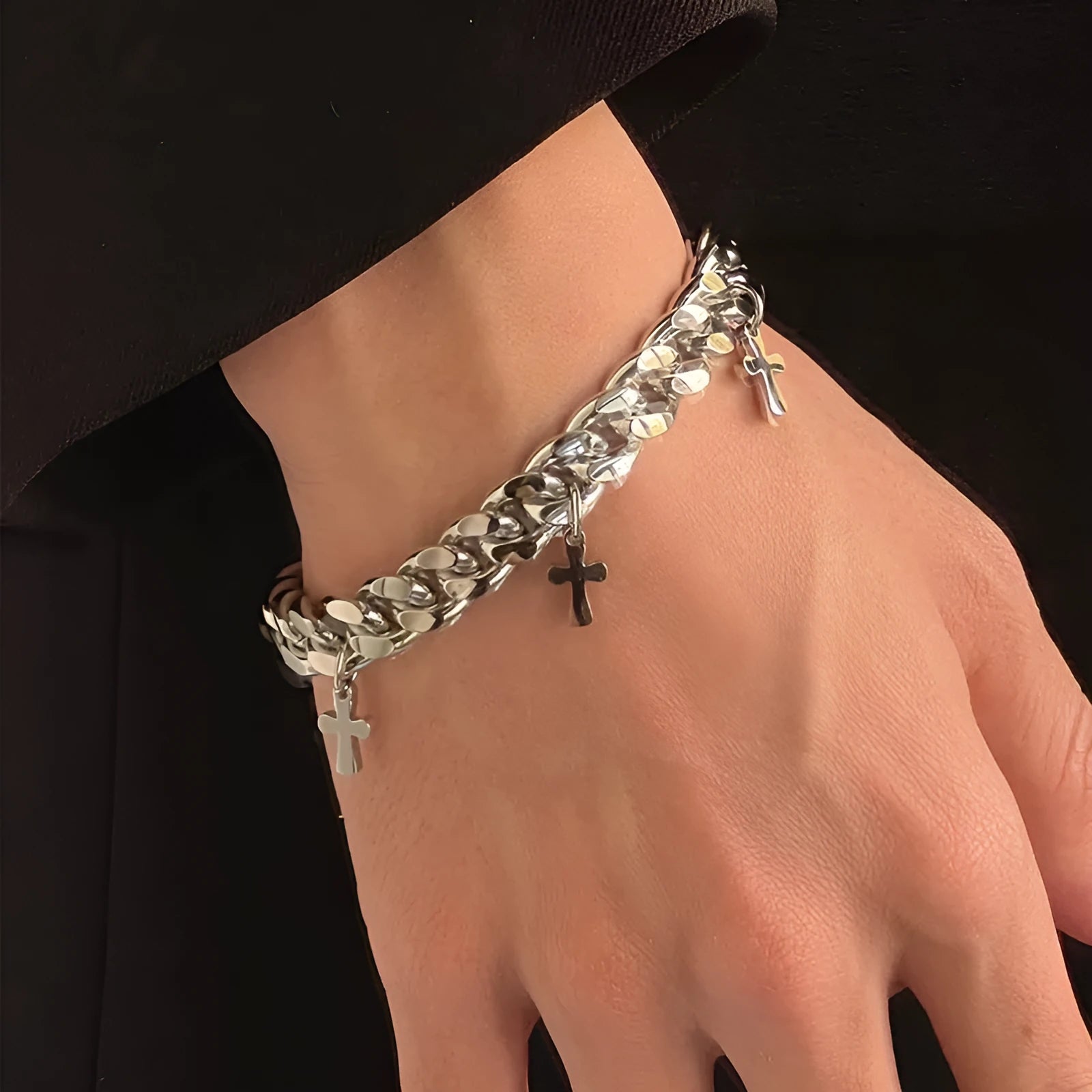 Men's titanium steel bracelet with a geometric shape and a central cross design.