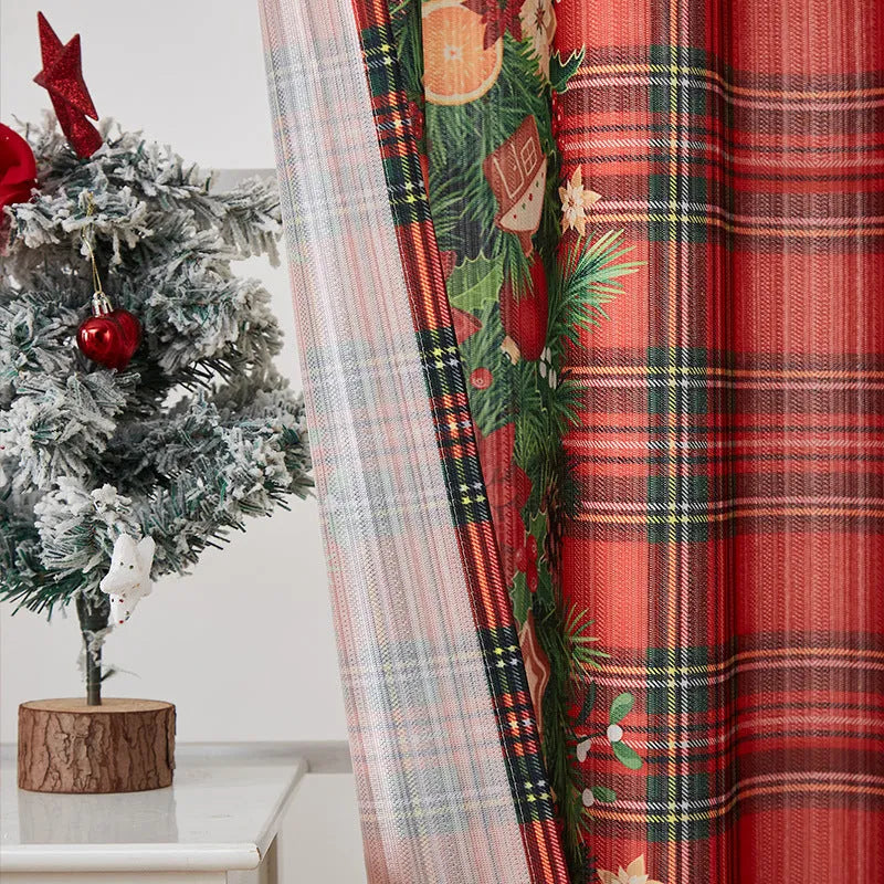Rectangular printed polyester curtain with festive design hanging in a window