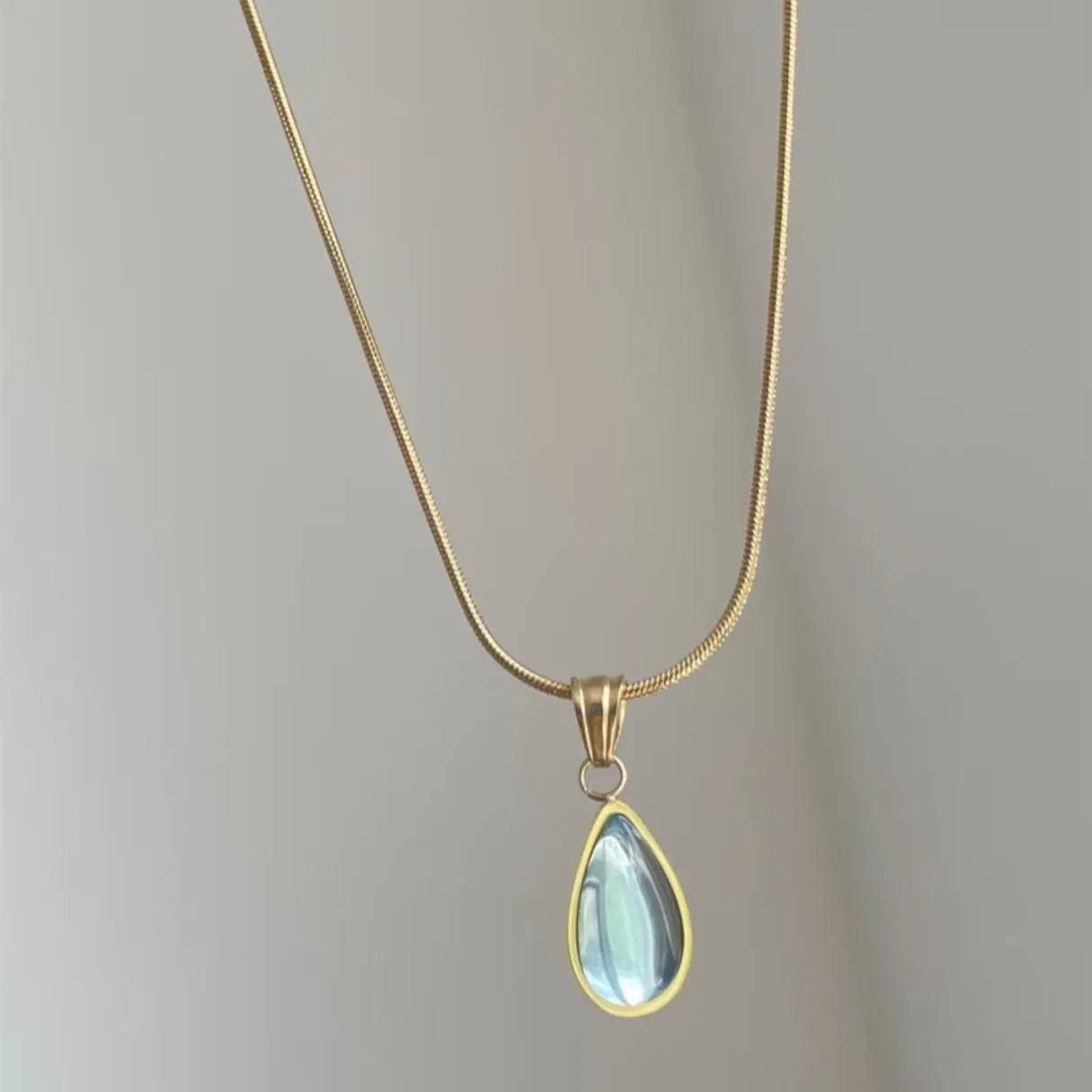 Blue and green water drop necklace with mixed gemstone pendant on titanium steel snake bone chain