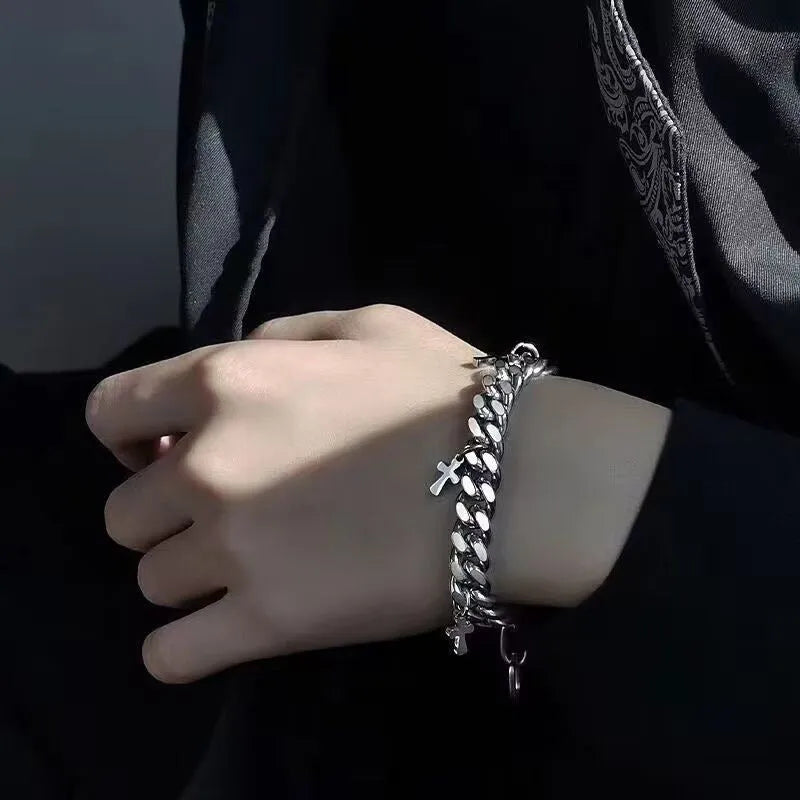 Men's titanium steel bracelet with a geometric shape and a central cross design.