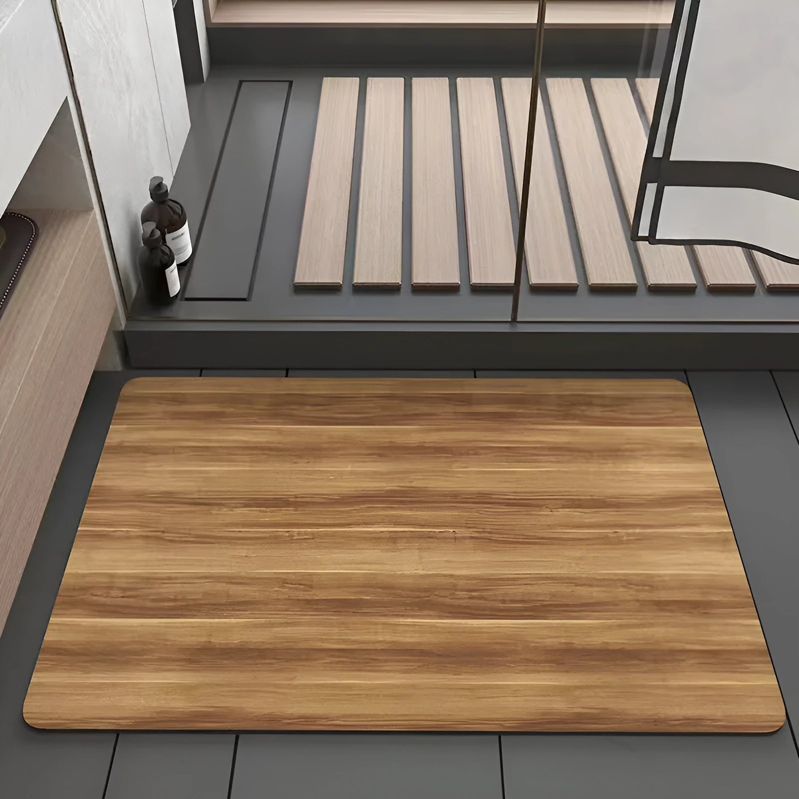 Square diatomite bathroom floor mat with wood grain geometric pattern on a tiled floor.