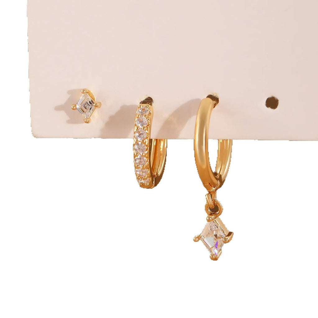 Ladies geometric zircon earring three-piece set in gold and silver colours showing pendant, stud, and clip styles