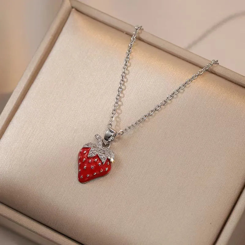 Titanium steel necklace with a delicate cherry charm on an O-ring chain.