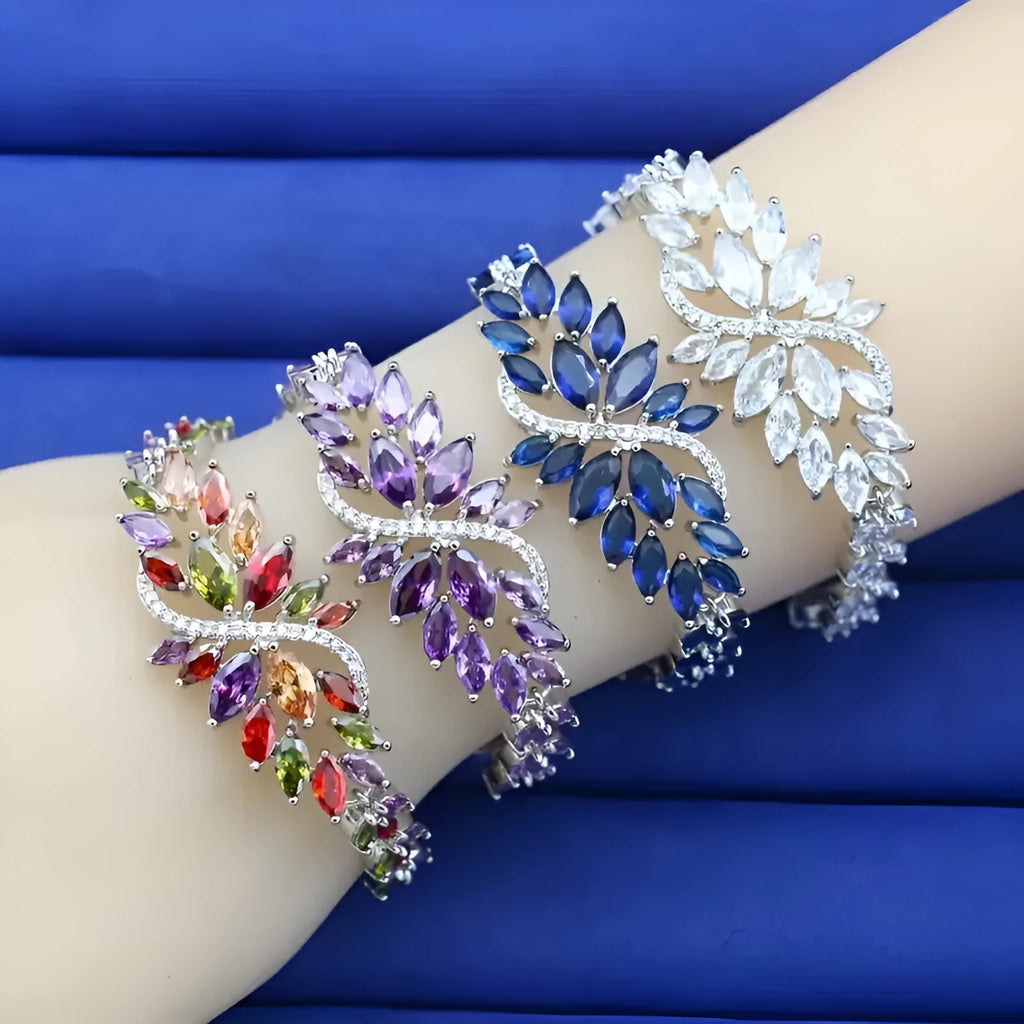 Copper fashion bracelet with gold electroplating and coloured zircon stones in ice flower design