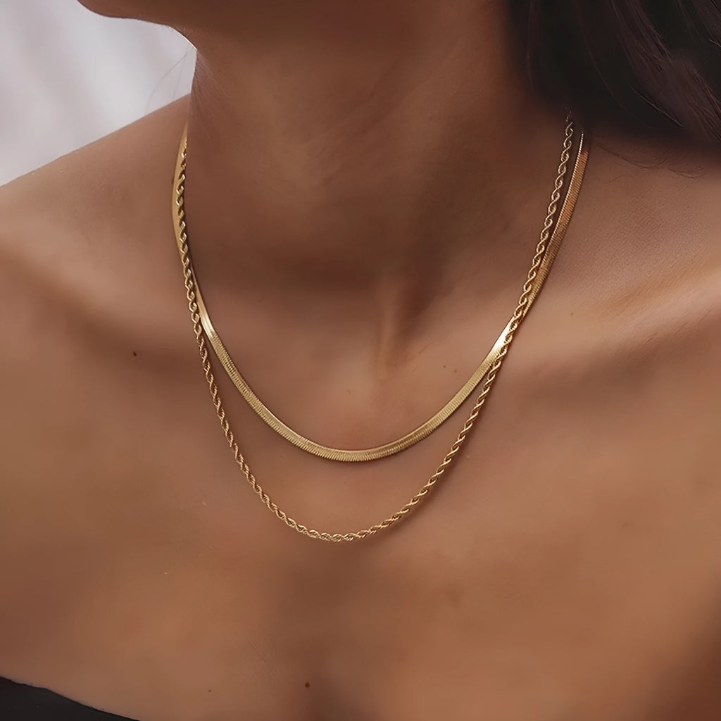 Retro double-layer twist necklace with geometric titanium steel pendant on an adjustable snake bones chain.