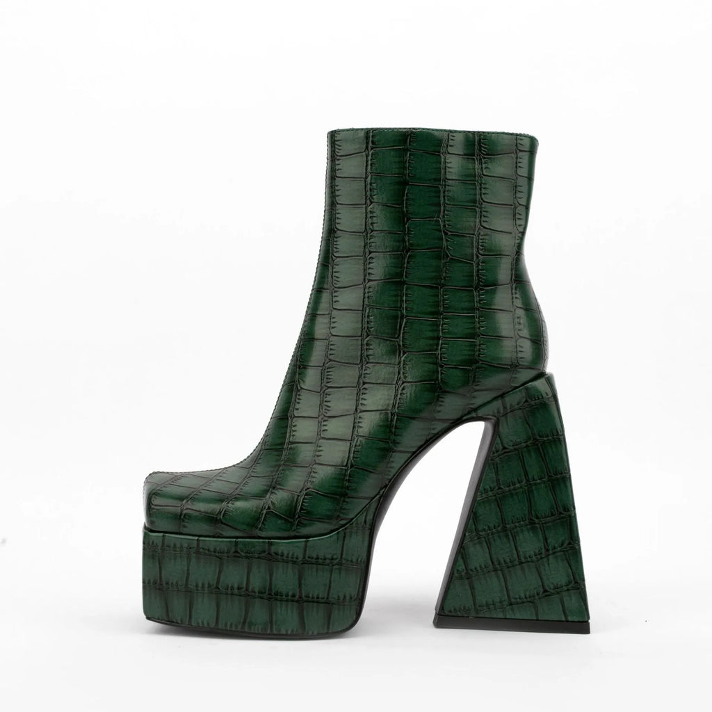 Women's ankle boot in artificial PU with a super high heel, shown in a solid colour.
