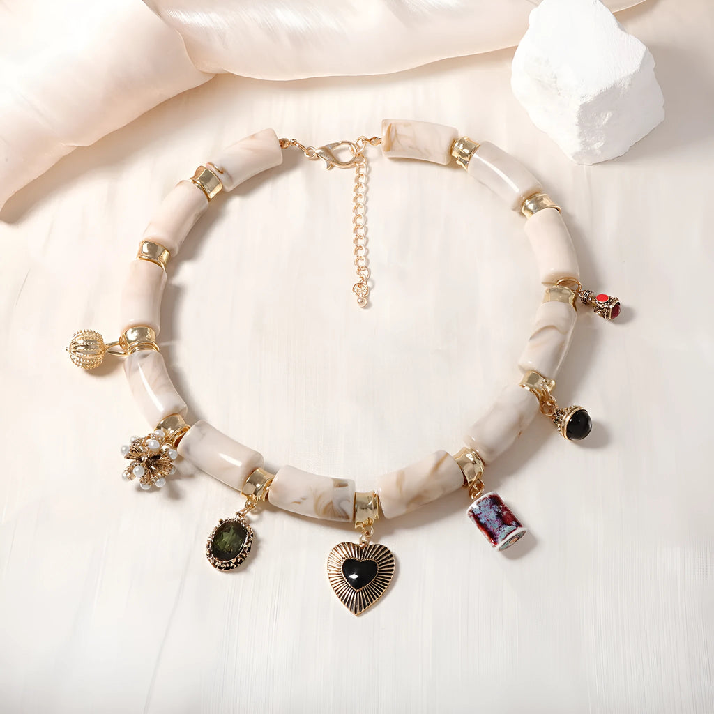 Heart-shaped resin bamboo necklace with electroplated finish in pictured colour