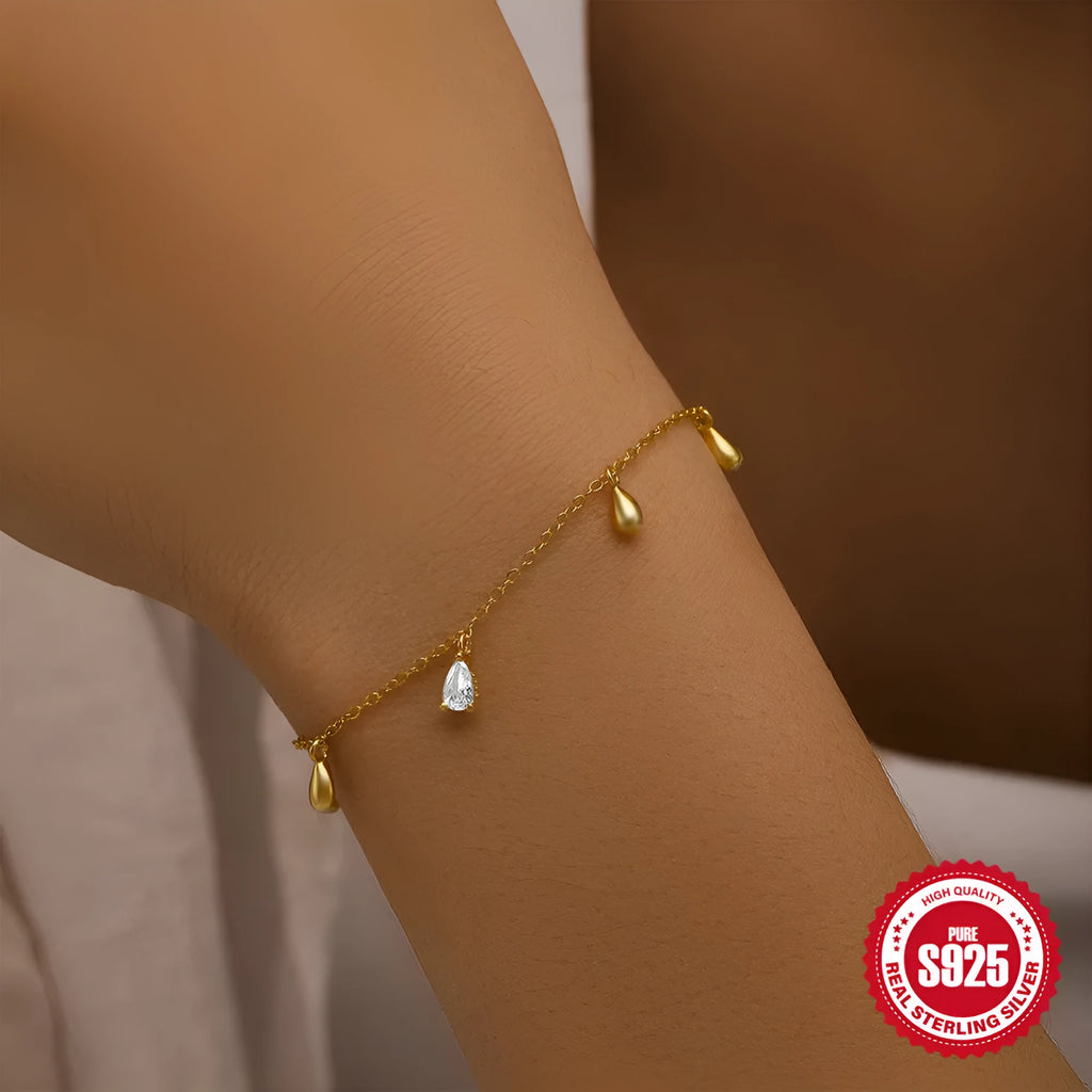 Water drop diamond geometric pendant on S925 sterling silver adjustable bracelet with gold colour finish