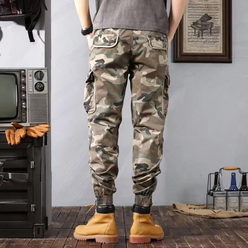 Men's camouflage cargo pants with multiple pockets and loose tapered fit