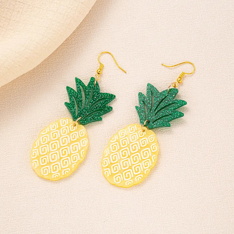 Women's alloy drop earrings with red and green acrylic jackfruit and coconut charms on a white background.
