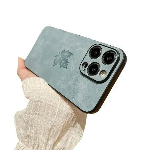 Skin feeling lambskin maple leaf phone case in blue for iPhone 17 with silicone protection