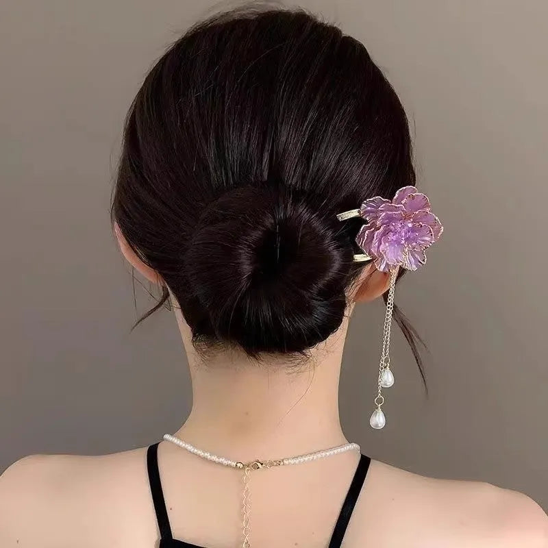 Purple and white U-shaped hairpin with peony flower design and tassel detail on alloy electroplated construction