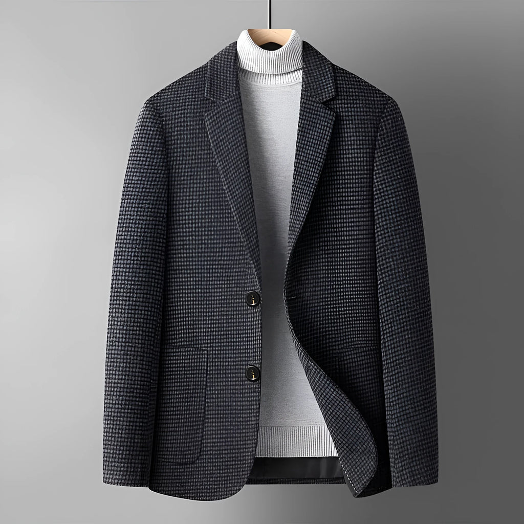 Men's slim fit wool suit jacket in grey shown on a hanger.