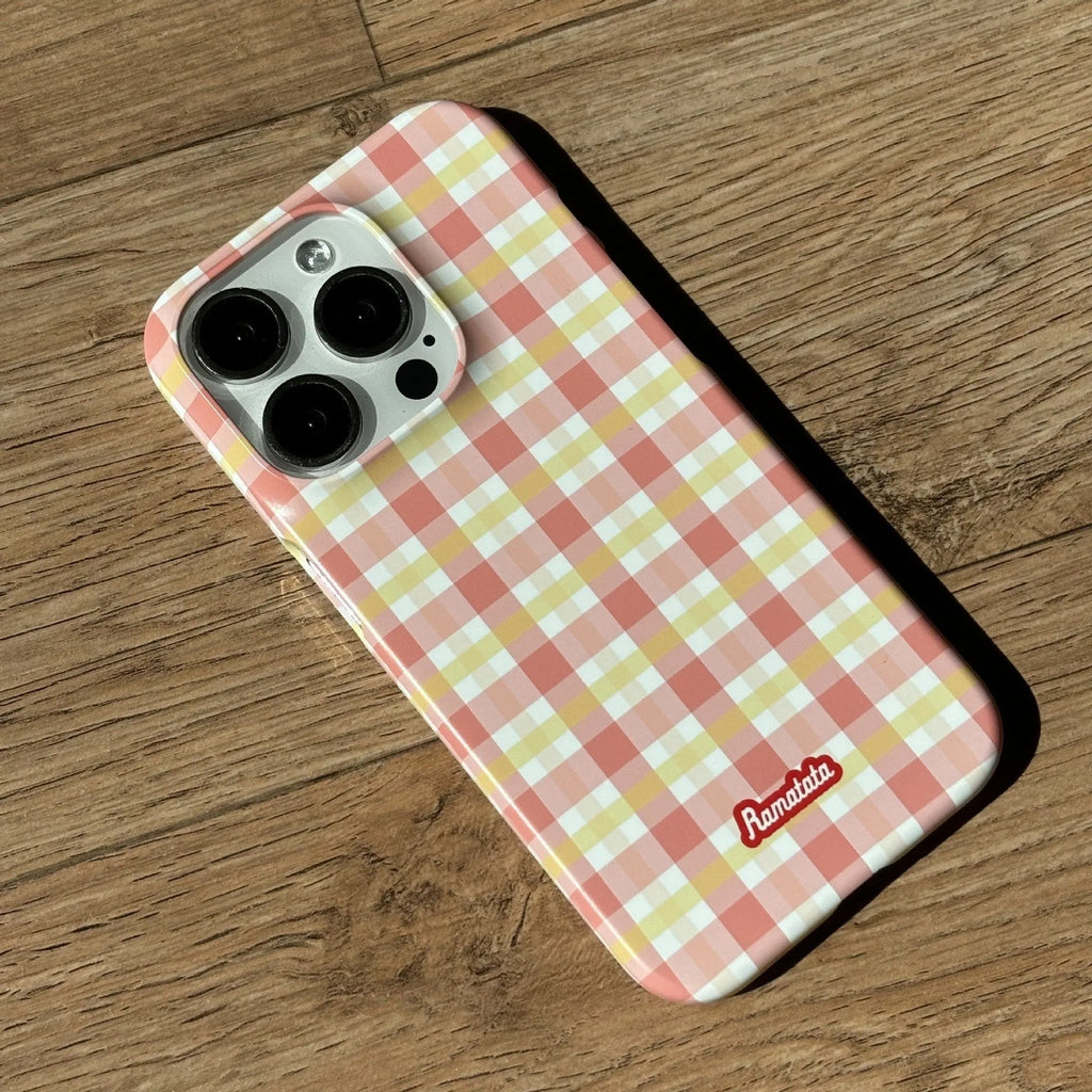 iPhone 15 Pro Max phone case with red plaid design and anti-fingerprint finish.
