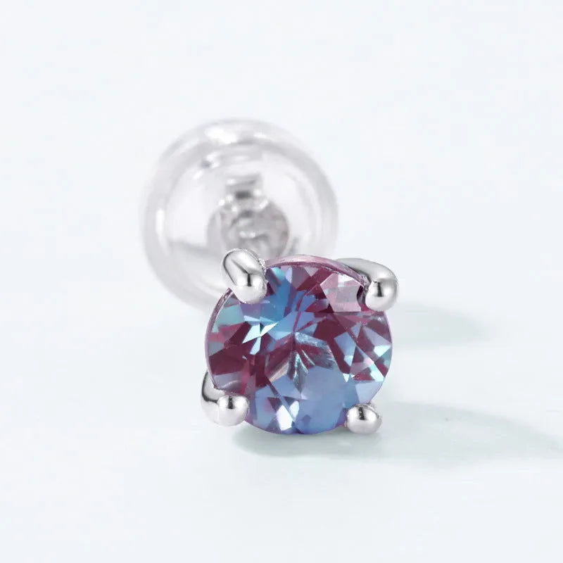 Simple round geometric Alexander stone stud earrings in 925 sterling silver.