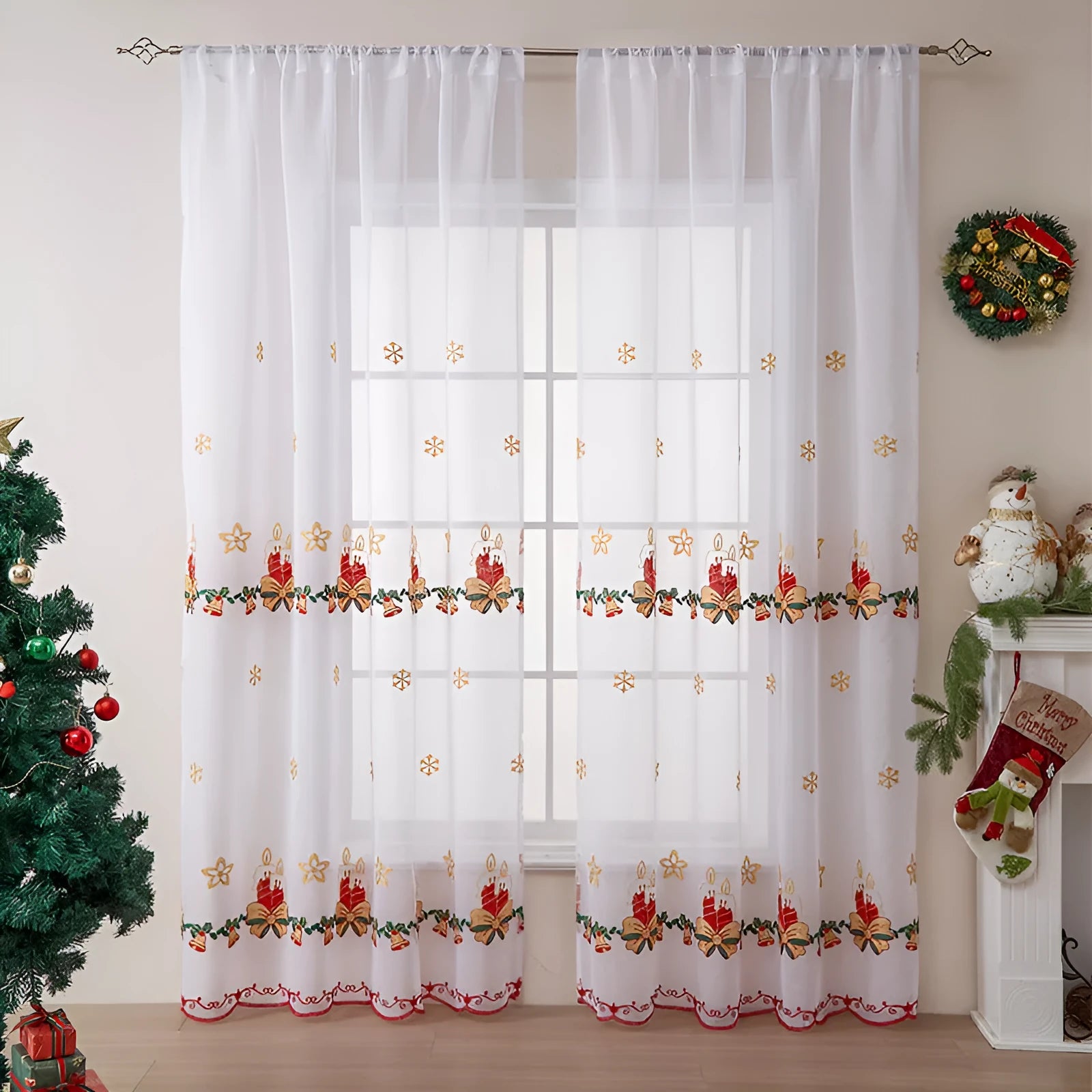 Pair of white polyester Christmas curtains with embroidered red snowflake design hung on a window