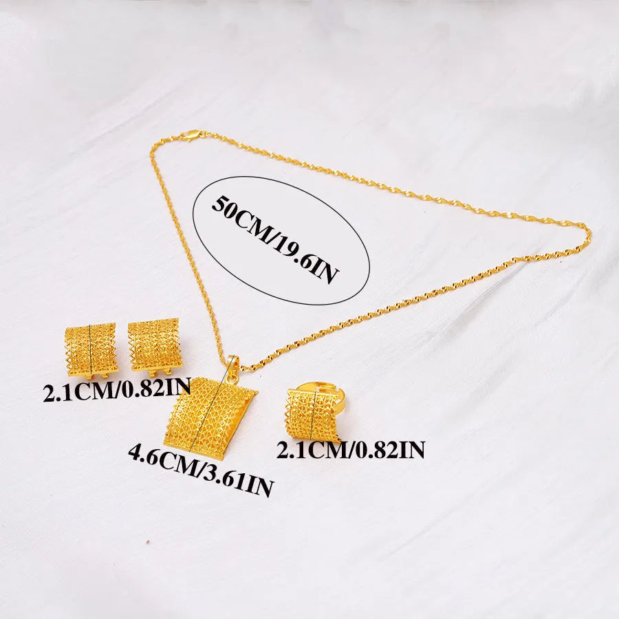 Gold tone bridal jewellery set with necklace, earrings and ring on display