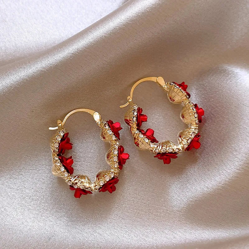 Alloy rose flower ear clip earrings in F155A red colour with clip-on fastening