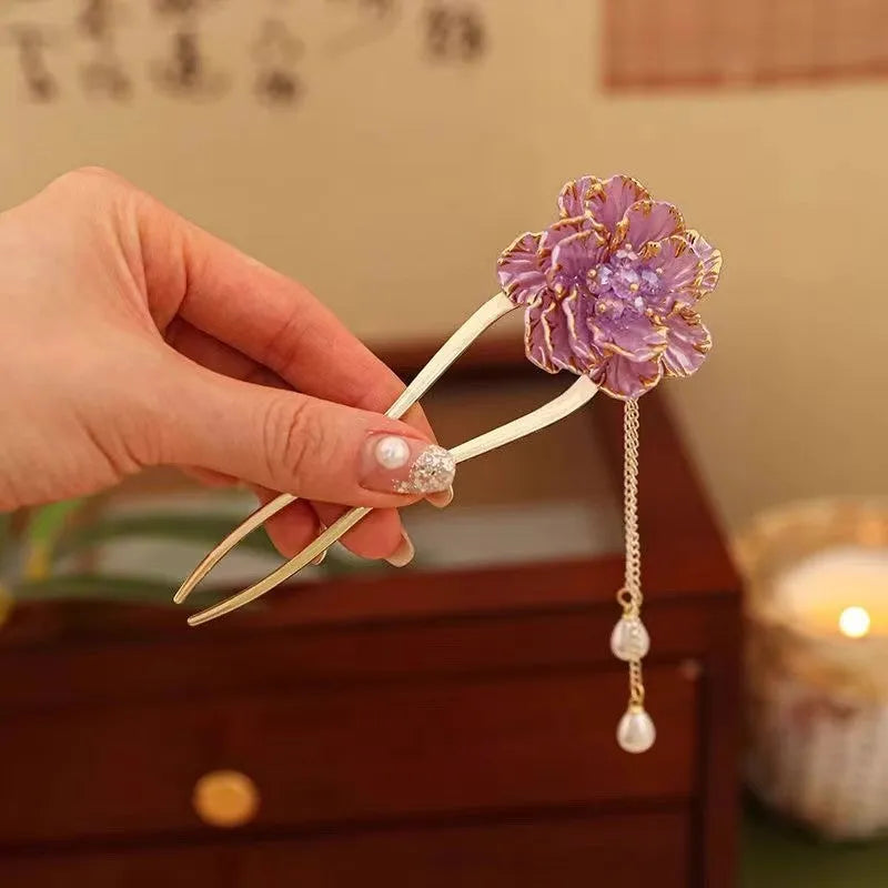 Purple and white U-shaped hairpin with peony flower design and tassel detail on alloy electroplated construction