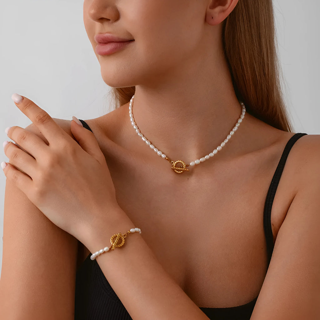 Freshwater pearl and stainless steel necklace bracelet set with geometric shapes on clavicle chain