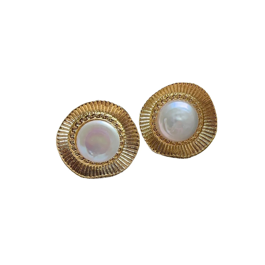 A pair of round gold electroplated earrings with a French retro simple style for women.