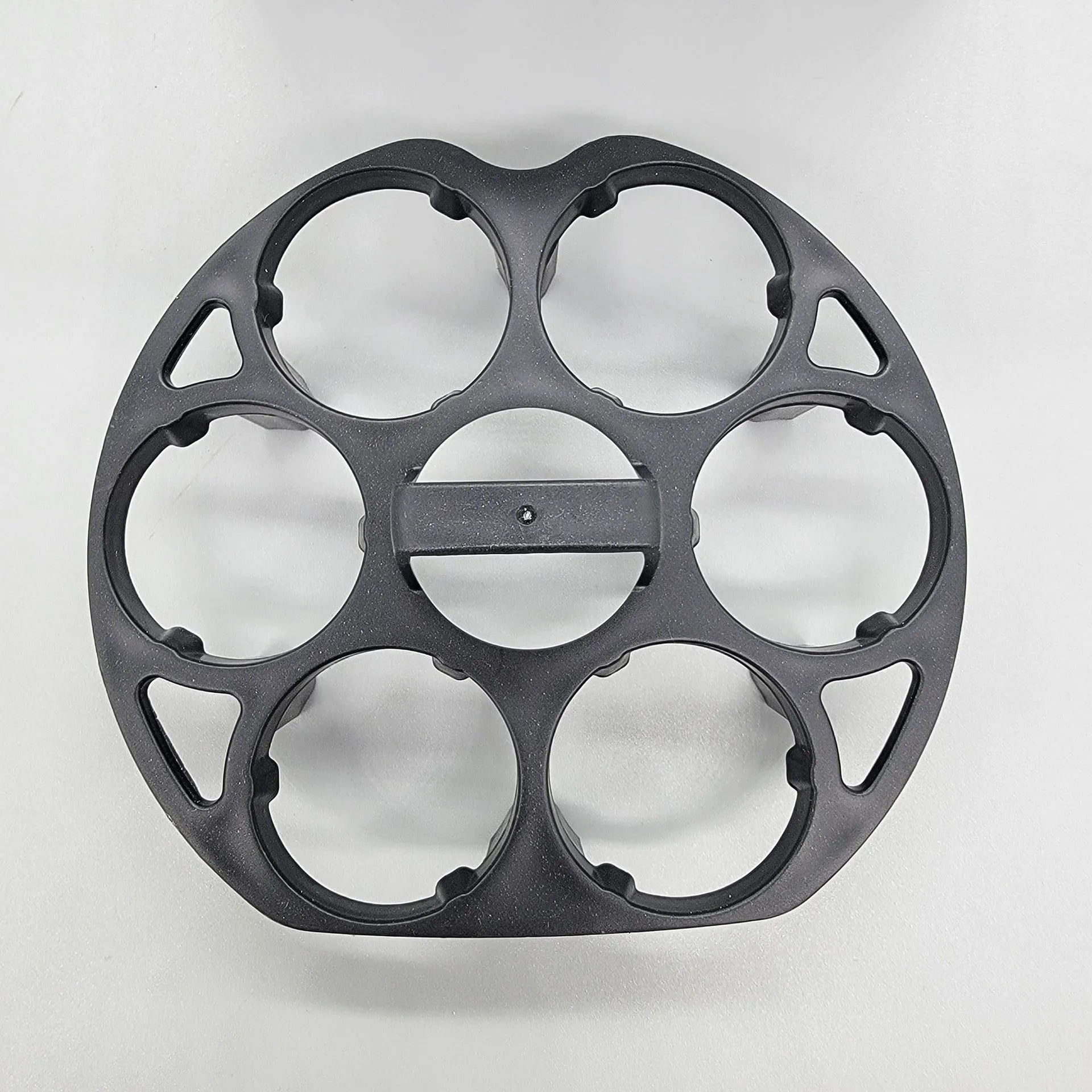 Black plastic egg holder with modern design measuring 13.8 by 12.6 by 5.7 centimetres