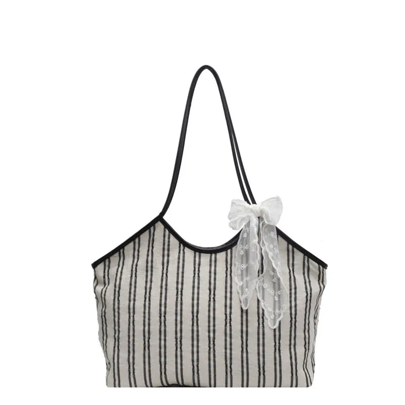 Striped cloth Korean style bucket shoulder messenger bag with beige ribbon scarf and woven belt detailing, soft horizontal square shape