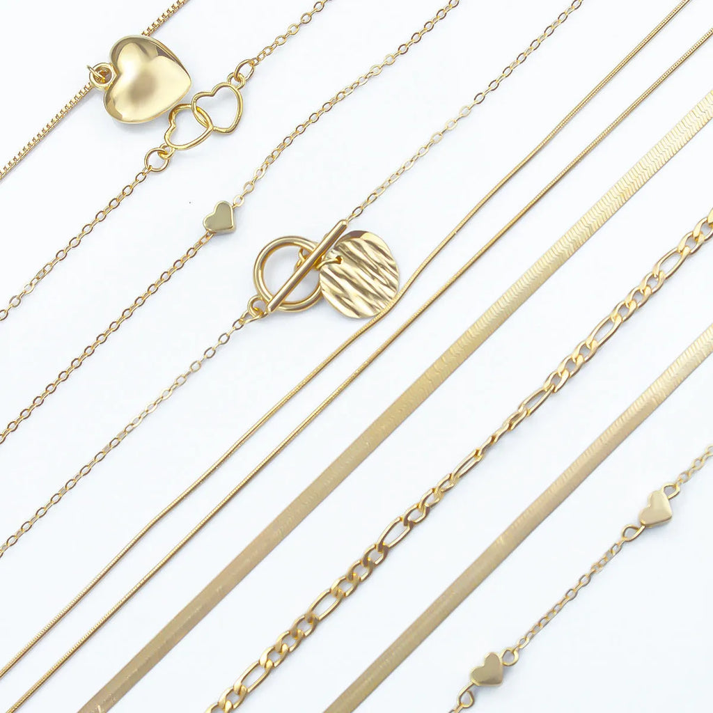 Gold women's necklace set with 10 alloy pendants on adjustable snake bone chain