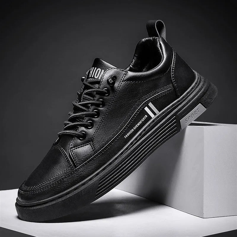 Men's low-top black and white skateboard shoes with elastic band closure and rubber sole