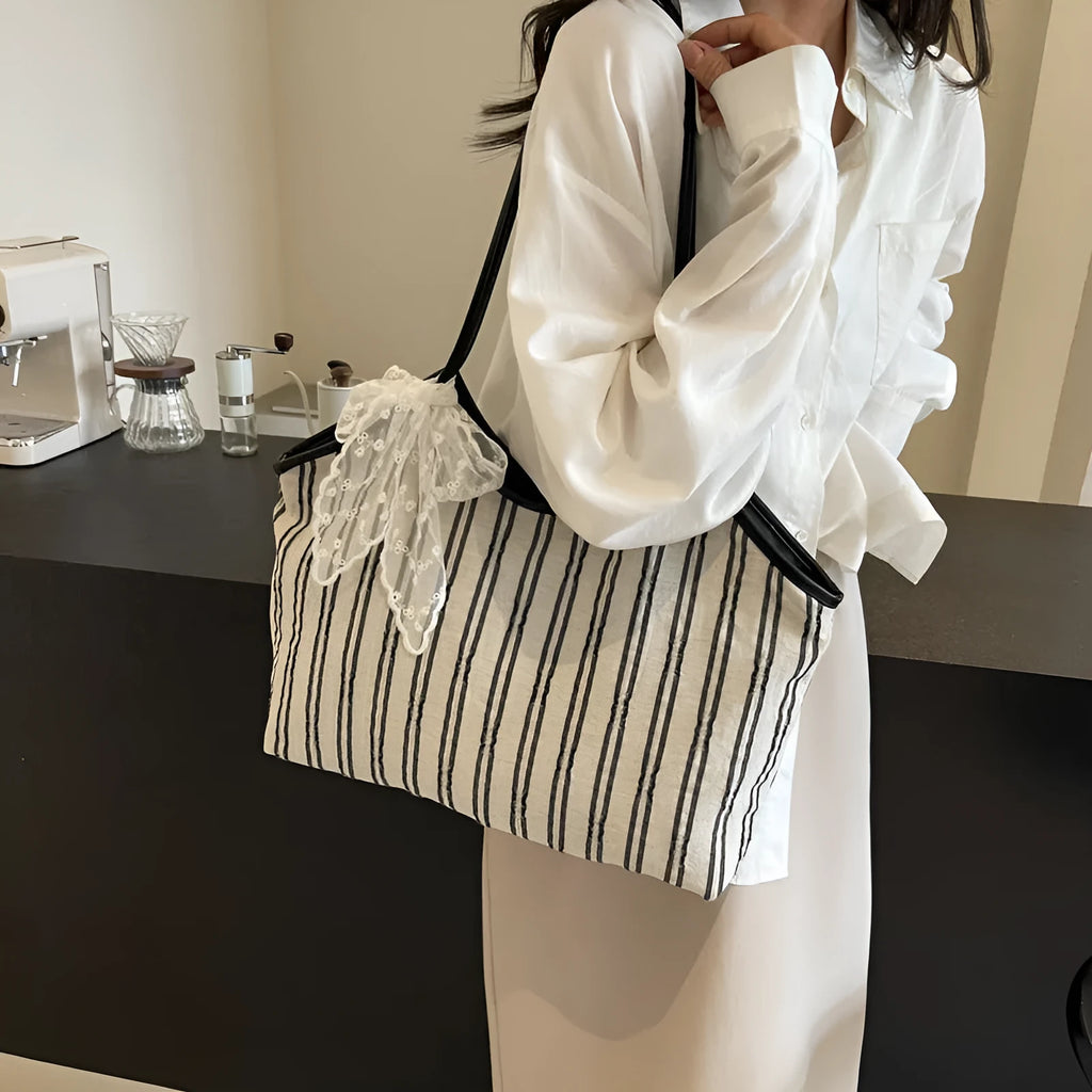 Striped cloth Korean style bucket shoulder messenger bag with beige ribbon scarf and woven belt detailing, soft horizontal square shape