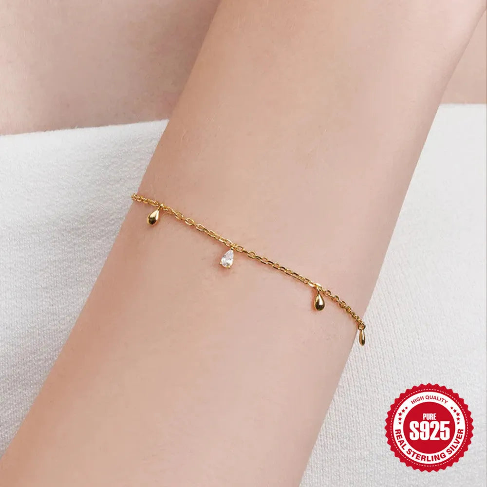 Water drop diamond geometric pendant on S925 sterling silver adjustable bracelet with gold colour finish