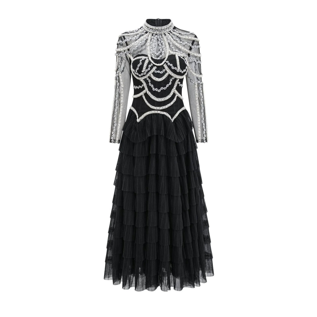 Women's long sleeve black beaded dress with three-dimensional decoration and mid-waist.