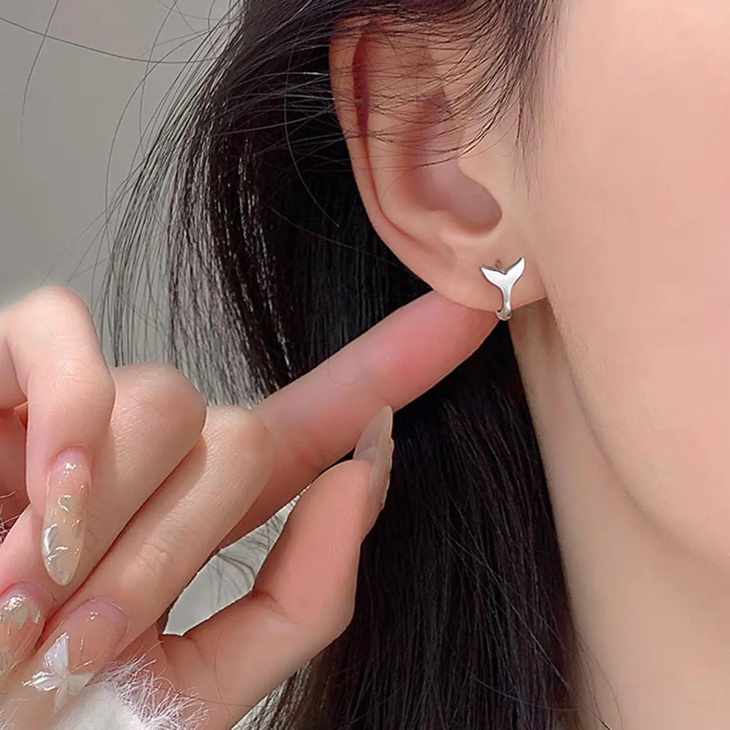 Women's fashion fishtail earrings in white gold or yellow gold electroplated finish