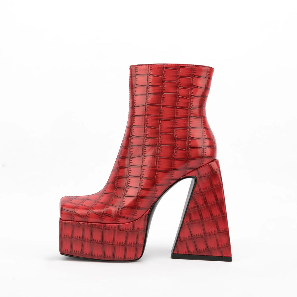 Women's ankle boot in artificial PU with a super high heel, shown in a solid colour.