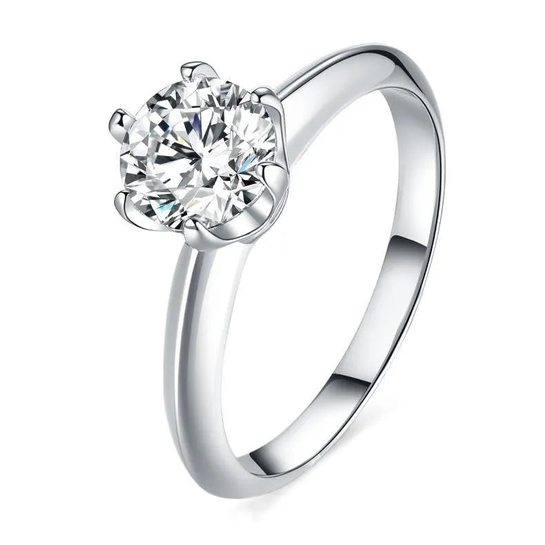 Adjustable heart-shaped moissanite couple ring with dragon, phoenix, and ten thousand words decorations on a silver-plated band.