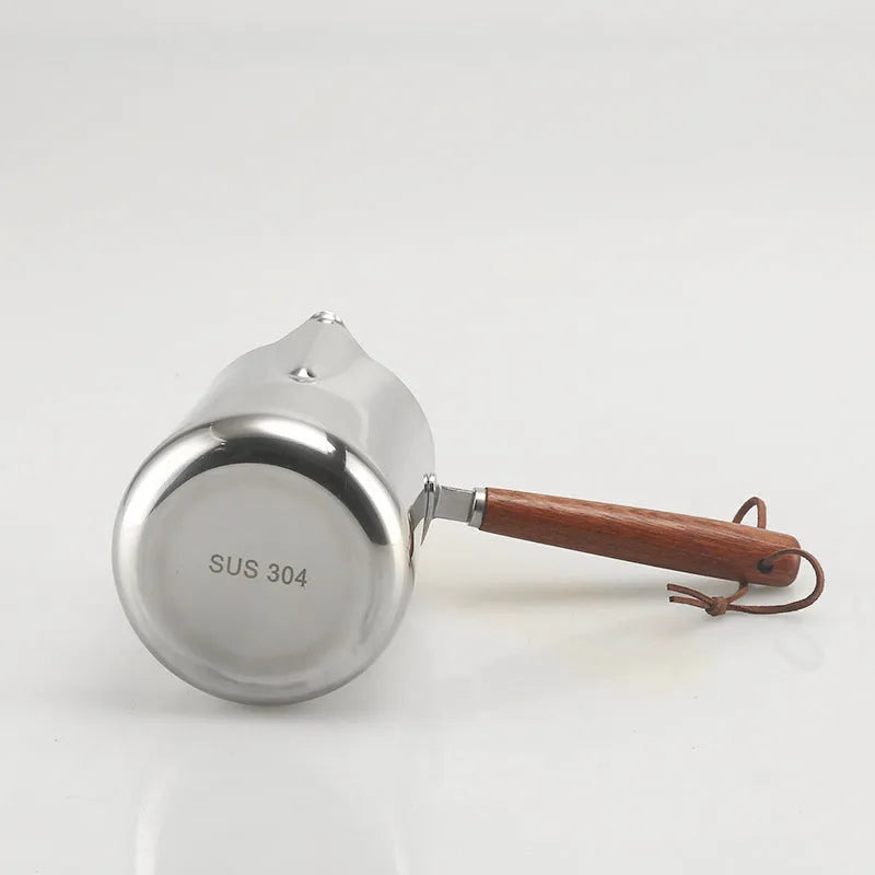 Stainless steel latte art milk jug with wooden handle in 350ml, 600ml, or 1000ml capacity options
