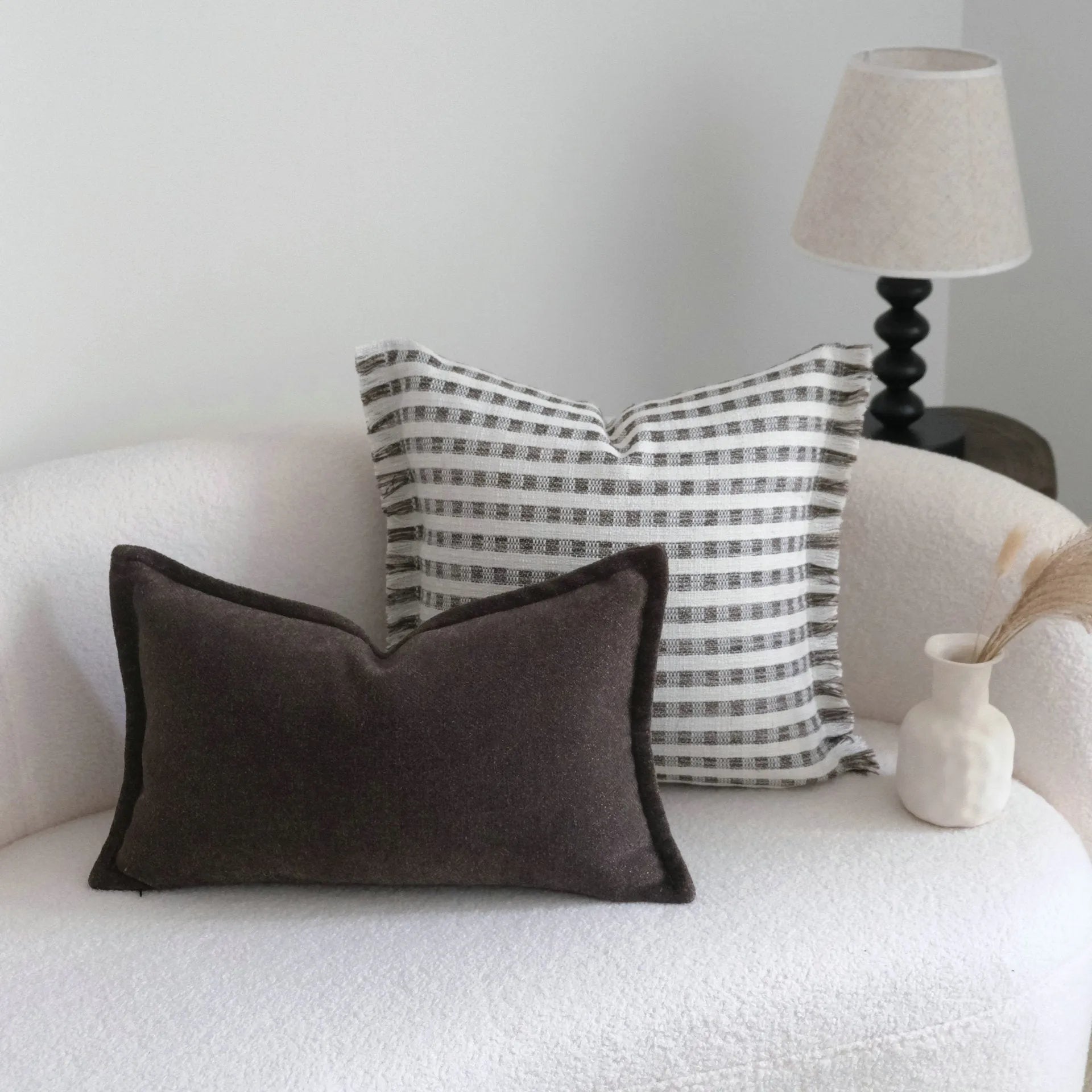 Coffee brown mid-century modern striped cushion on a sofa, showing 30x50cm and 45x45cm size options.