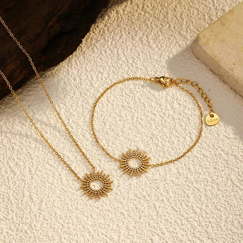 Sunflower series geometric gold chain necklace and bracelet set for women.