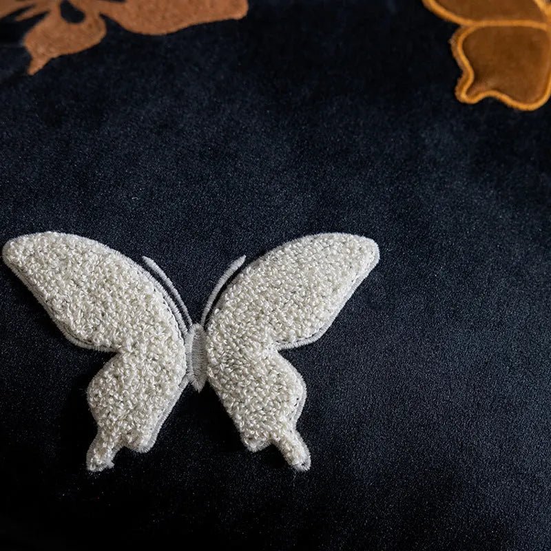 Square cushion with Chinese butterfly embroidery in beige, black, or purple colours.