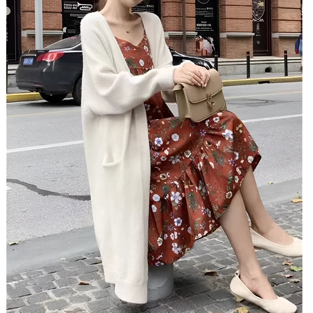 Women's mid-length loose fit knitted cardigan coat in solid colour with pockets, 65cm long, acrylic blend