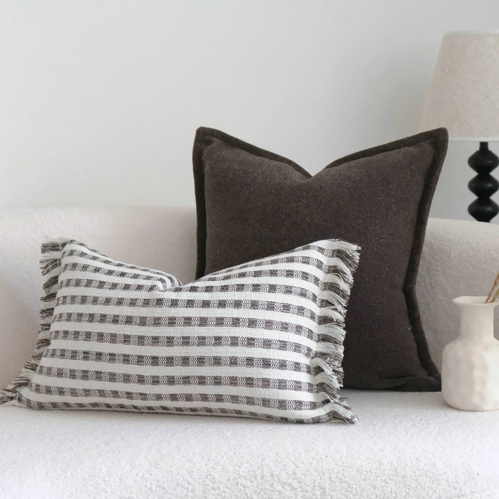 Coffee brown mid-century modern striped cushion on a sofa, showing 30x50cm and 45x45cm size options.