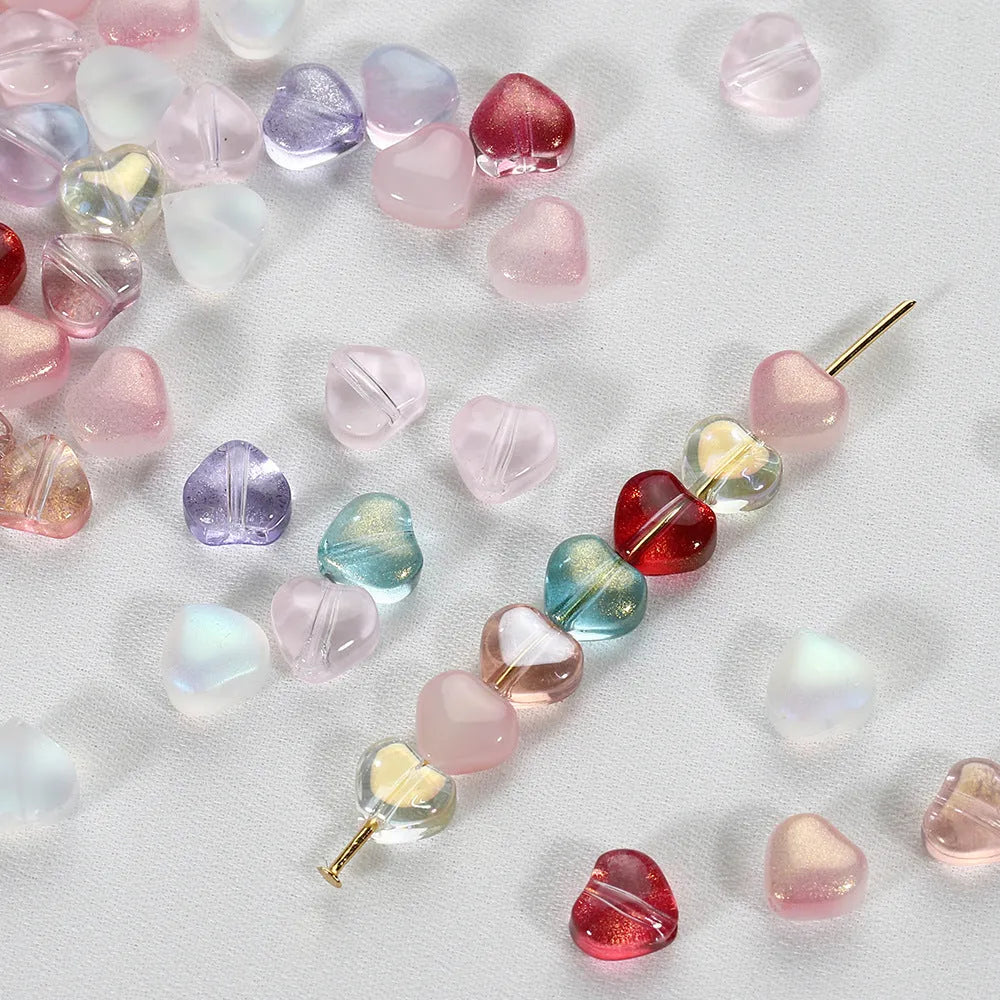 20 transparent Czech glass spacer beads with love pattern in aurora colours for DIY jewellery making