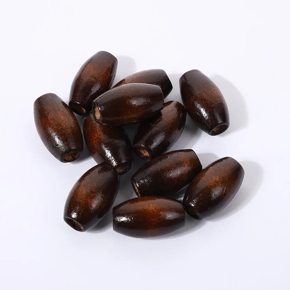Oval wooden bead with M-shaped raised texture in dark coffee colour, showing 25mm dimensions