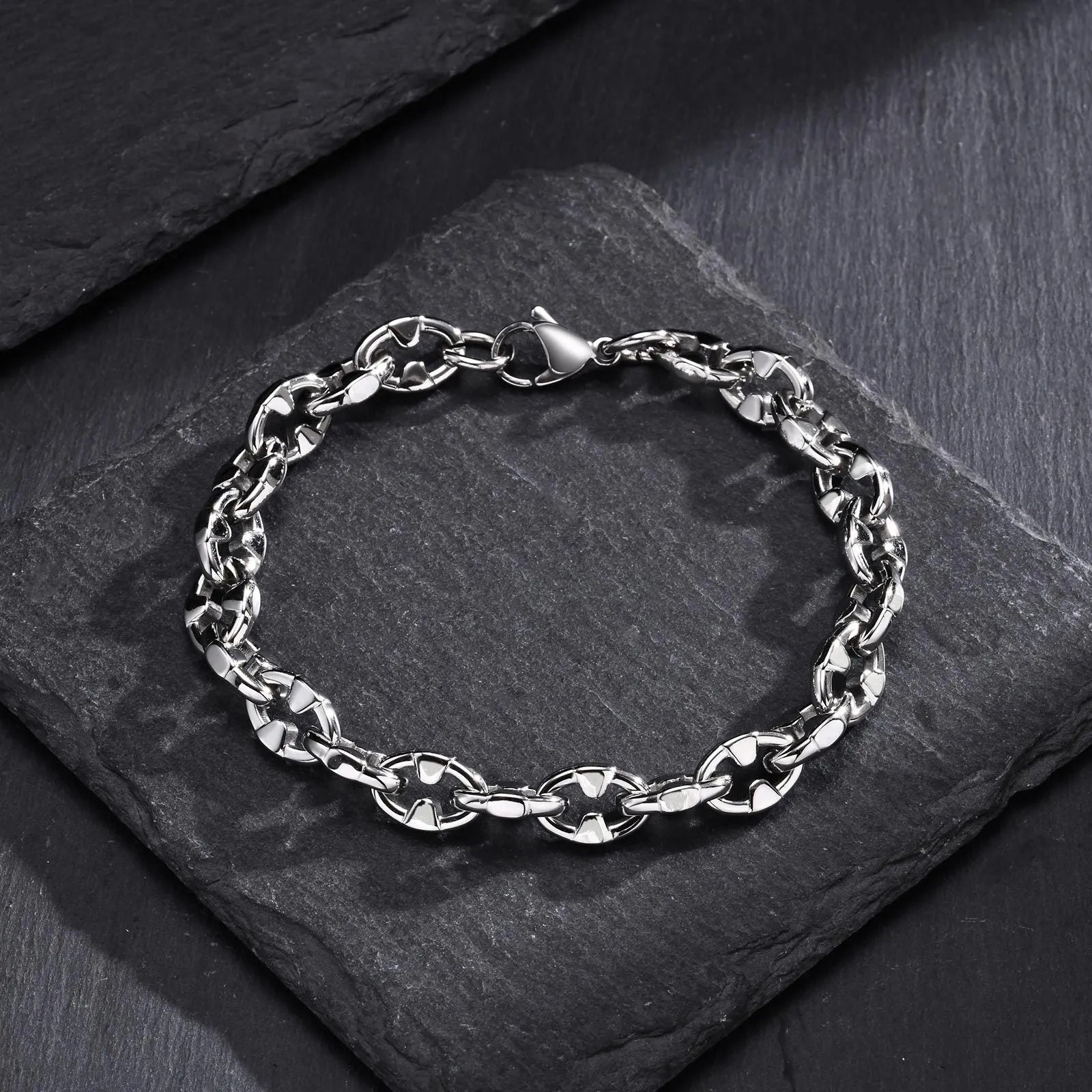 Thick geometric stainless steel chain bracelet in steel colour for men's hip hop fashion.
