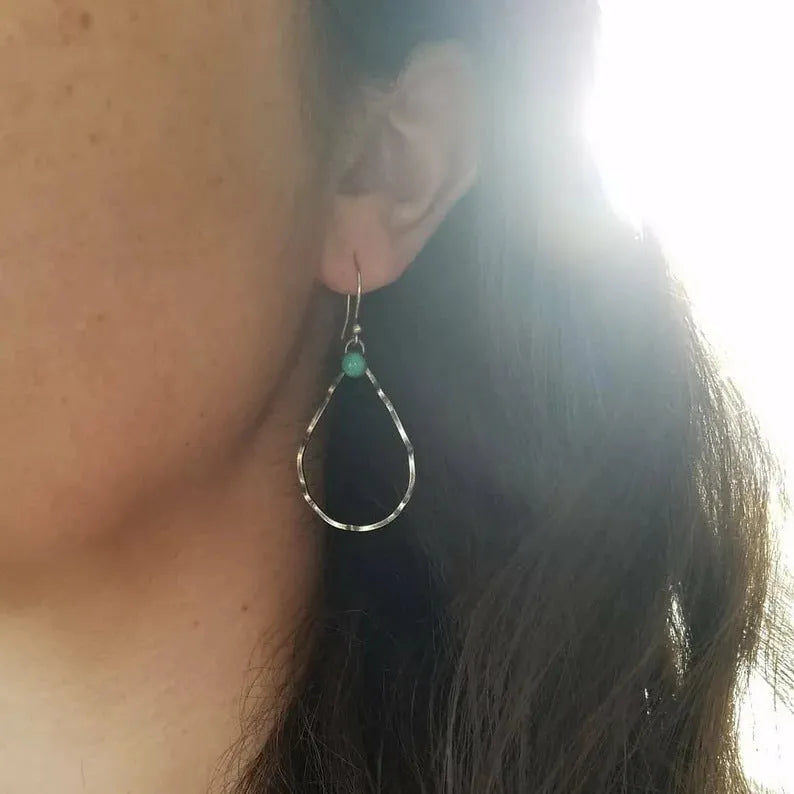 Bohemian-style vintage circle earrings with turquoise geometric detailing in antique silver finish