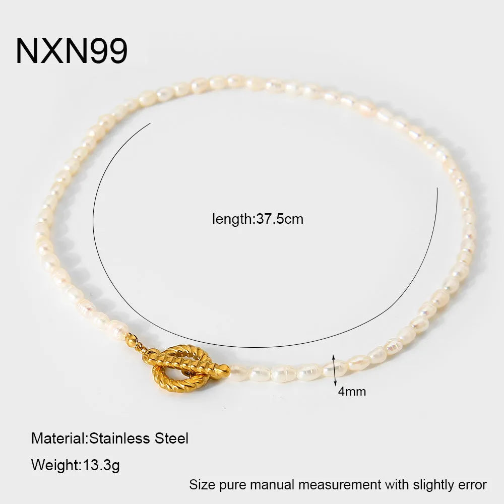 Freshwater pearl and stainless steel necklace bracelet set with geometric shapes on clavicle chain