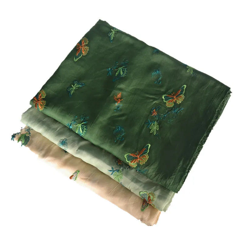 Pure ramie embroidery cloth fabric for hanfu, shown in beige, grass green, and dark green colours.