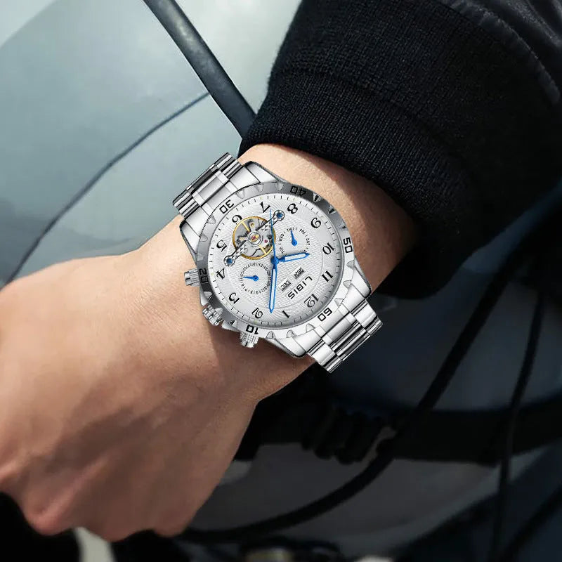 Men's silver automatic perpetual calendar mechanical watch with a stainless steel bracelet.